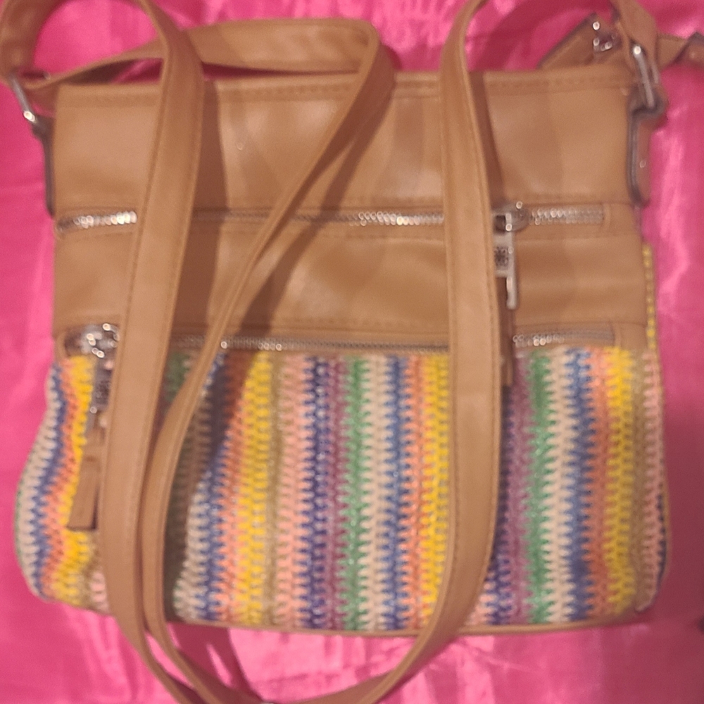 Multicolored purse with zipper closure and outside phone pockets, made in China